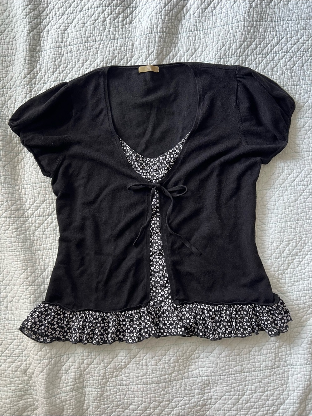 floral blouse with ruffle texture at bottom
